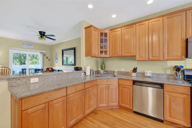 a kitchen with sink cabinets and window