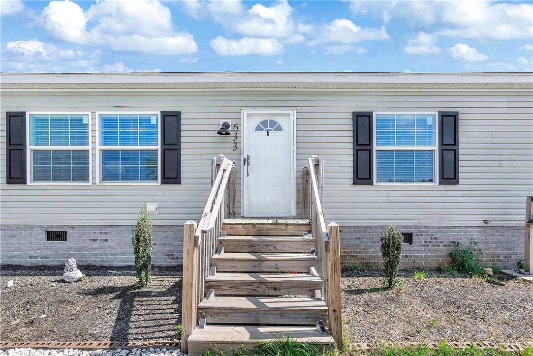 633 Project Road Iva, SC 29655 - Photo 2 of 38 This charming home offers a welcoming facade with classic details and inviting curb appeal.