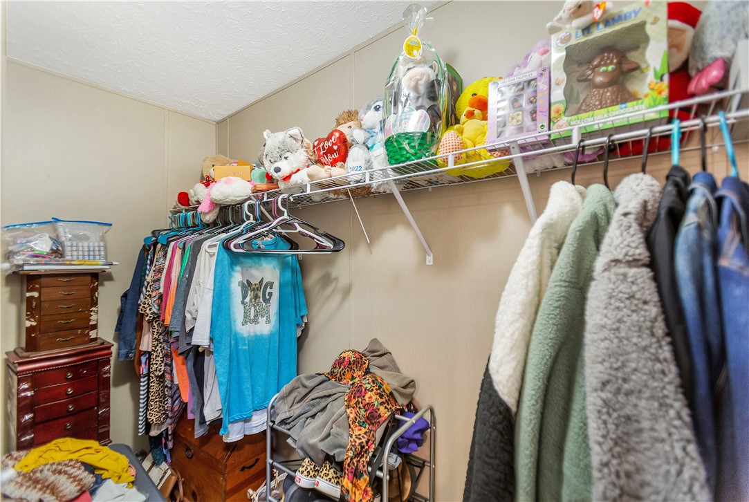 633 Project Road Iva, SC 29655 - Photo 21 of 38 This organized closet features ample shelving and hanging space for all your storage needs.