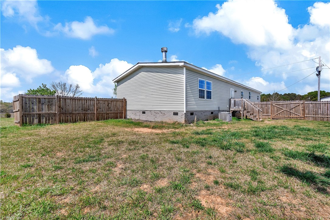 633 Project Road Iva, SC 29655 - Photo 30 of 38 This residence features a private yard, offering a tranquil outdoor retreat.