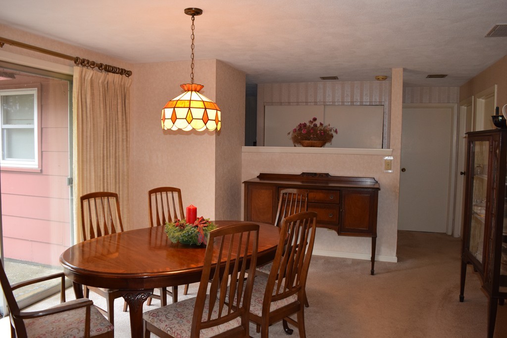 71 Old Stage Road Chelmsford, MA 01824 - Photo 3 of 15 a dining room with furniture and window