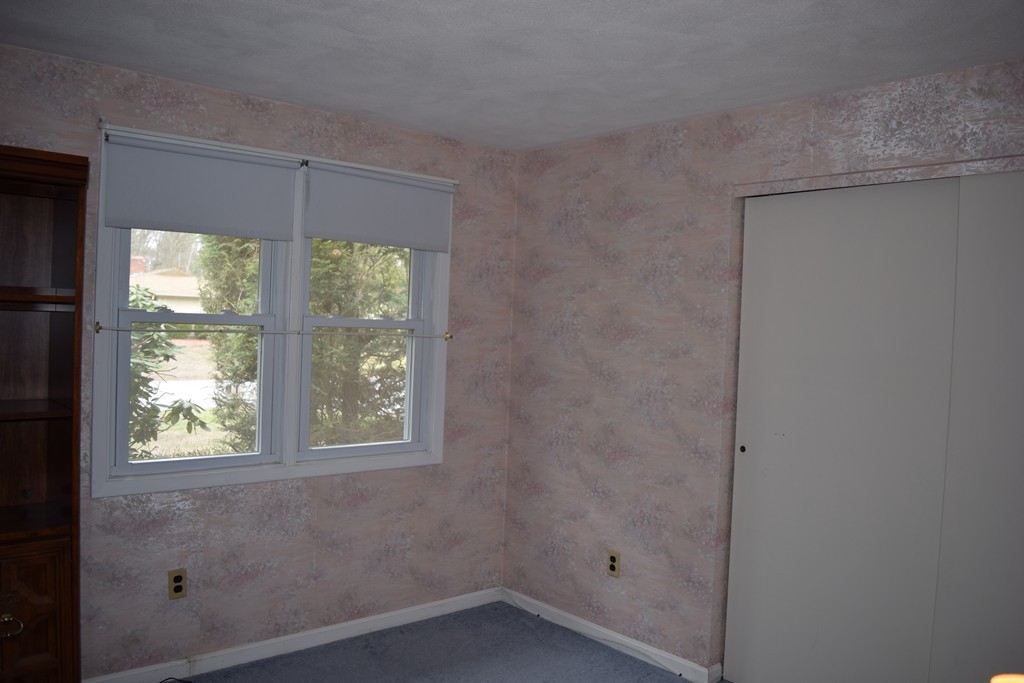 71 Old Stage Road Chelmsford, MA 01824 - Photo 10 of 15 an empty room with windows