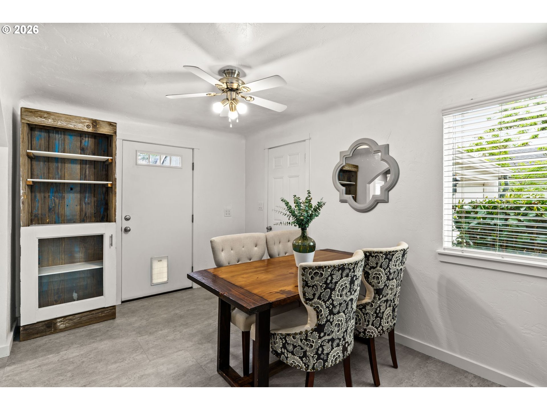 3155 Bell Avenue Eugene, OR 97402 - Photo 12 of 30 a view of a dining room with furniture and a window