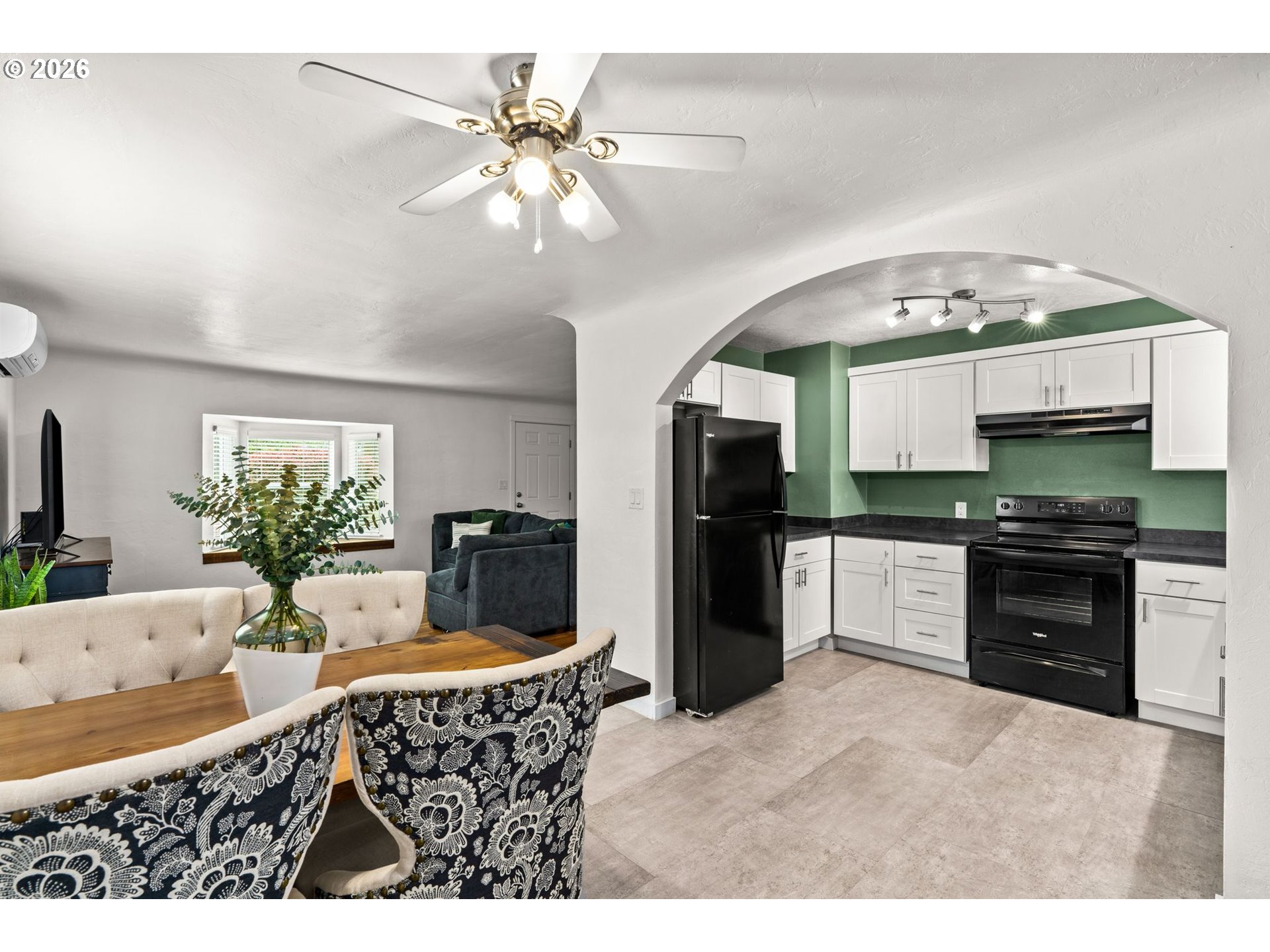 3155 Bell Avenue Eugene, OR 97402 - Photo 13 of 30 a kitchen with a table chairs and refrigerator