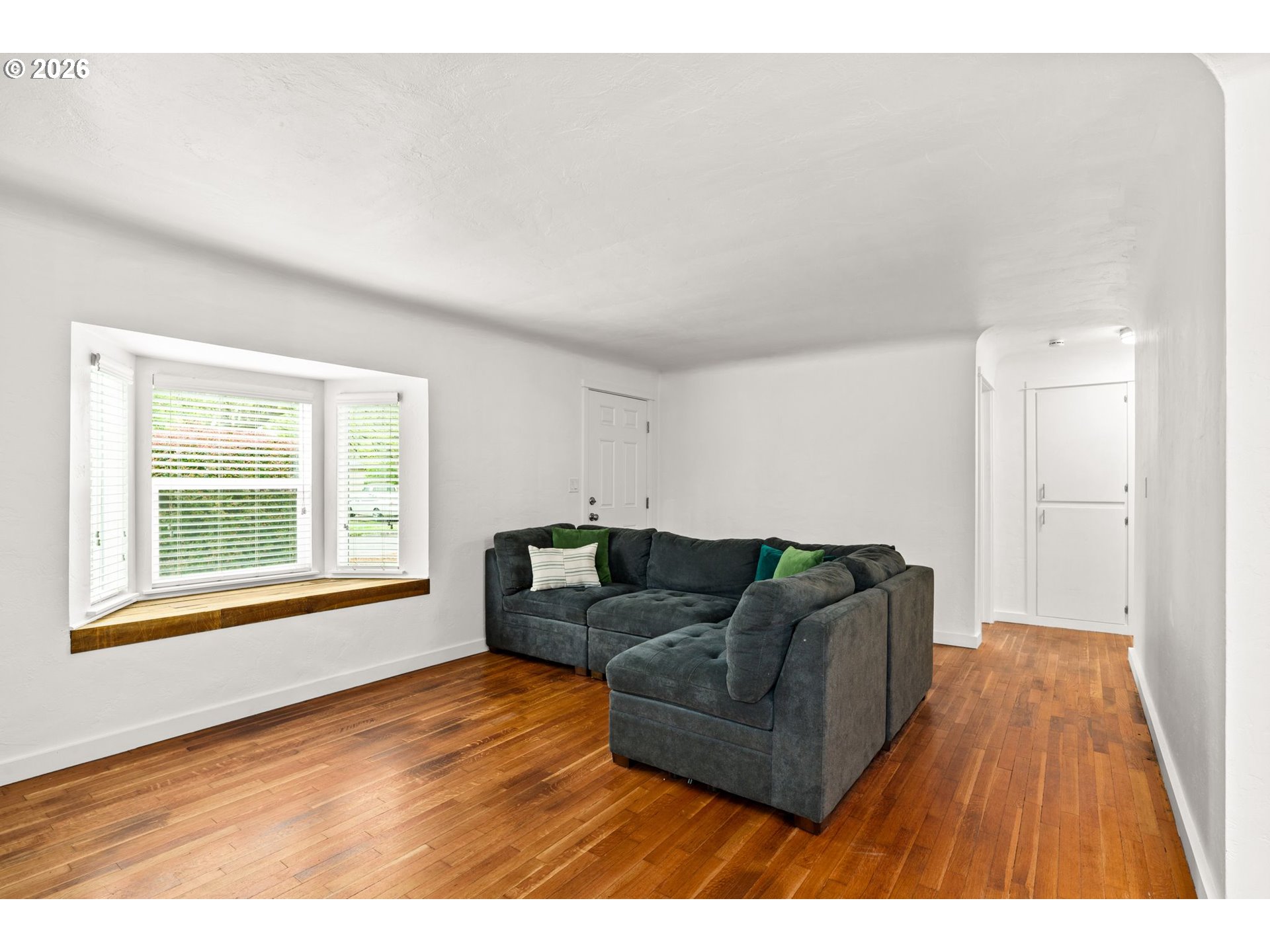 3155 Bell Avenue Eugene, OR 97402 - Photo 15 of 30 a living room with furniture and a window