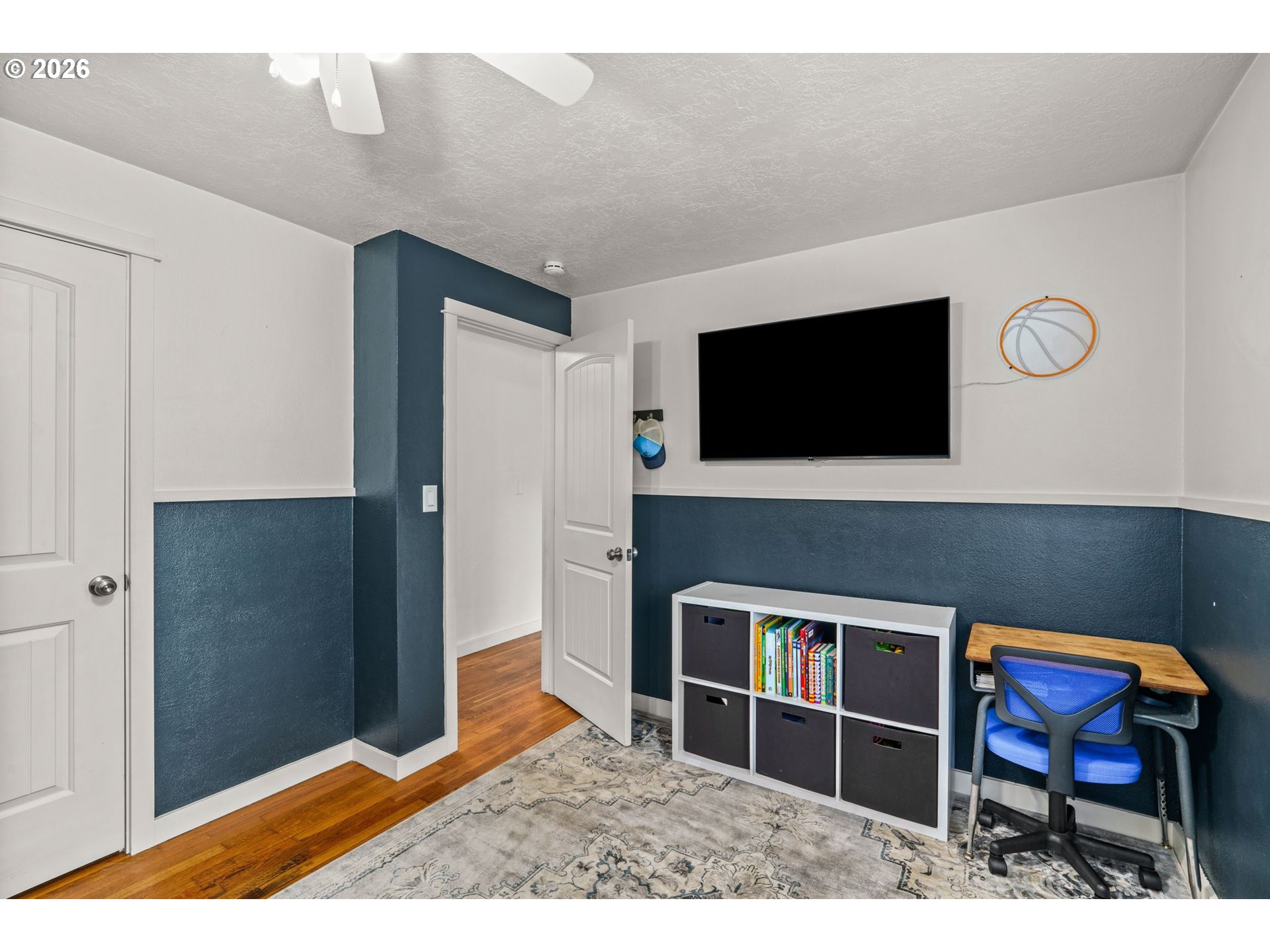 3155 Bell Avenue Eugene, OR 97402 - Photo 18 of 30 a living room with a flat screen tv and outdoor space