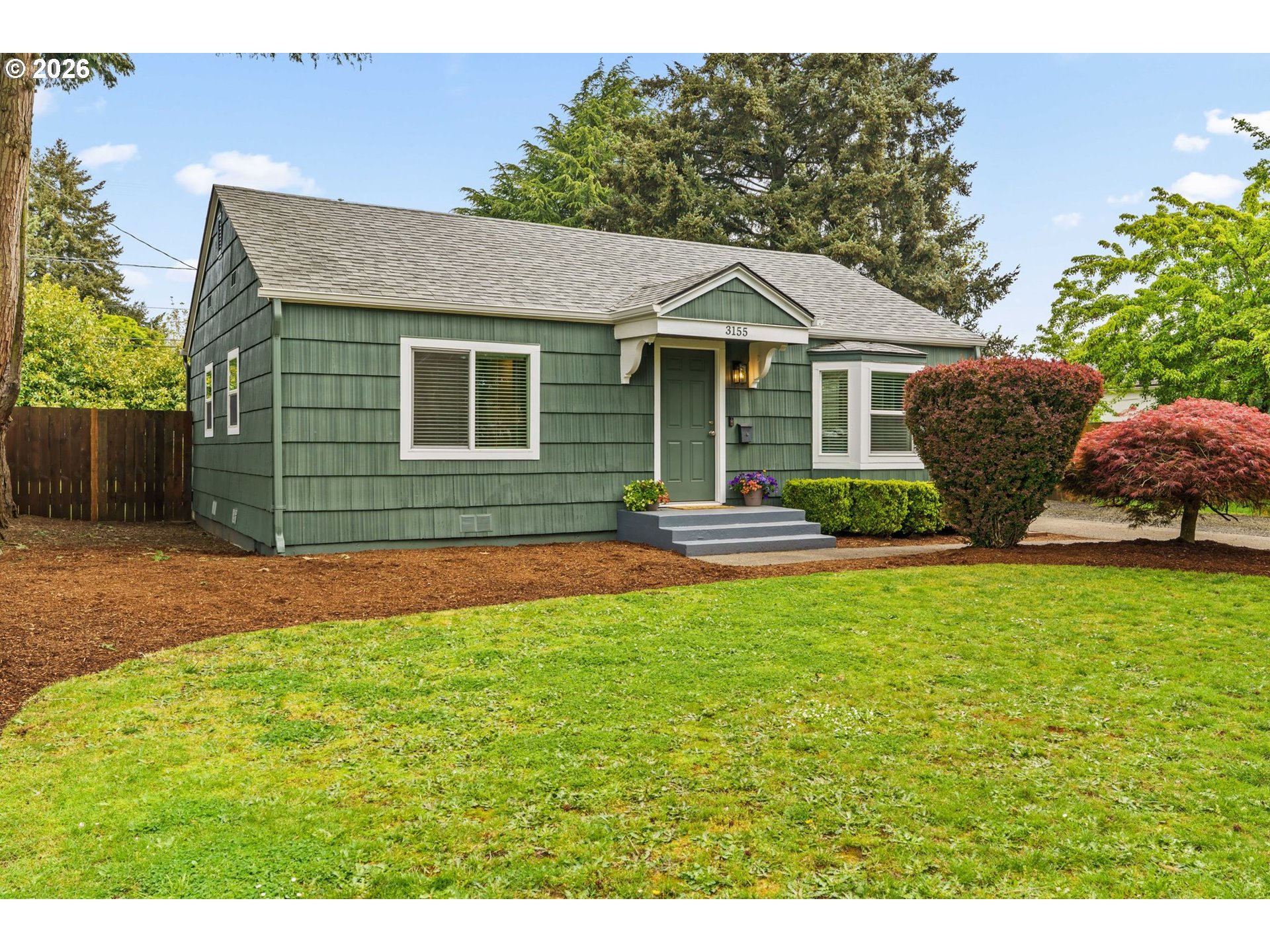 3155 Bell Avenue Eugene, OR 97402 - Photo 2 of 30 a front view of a house with garden