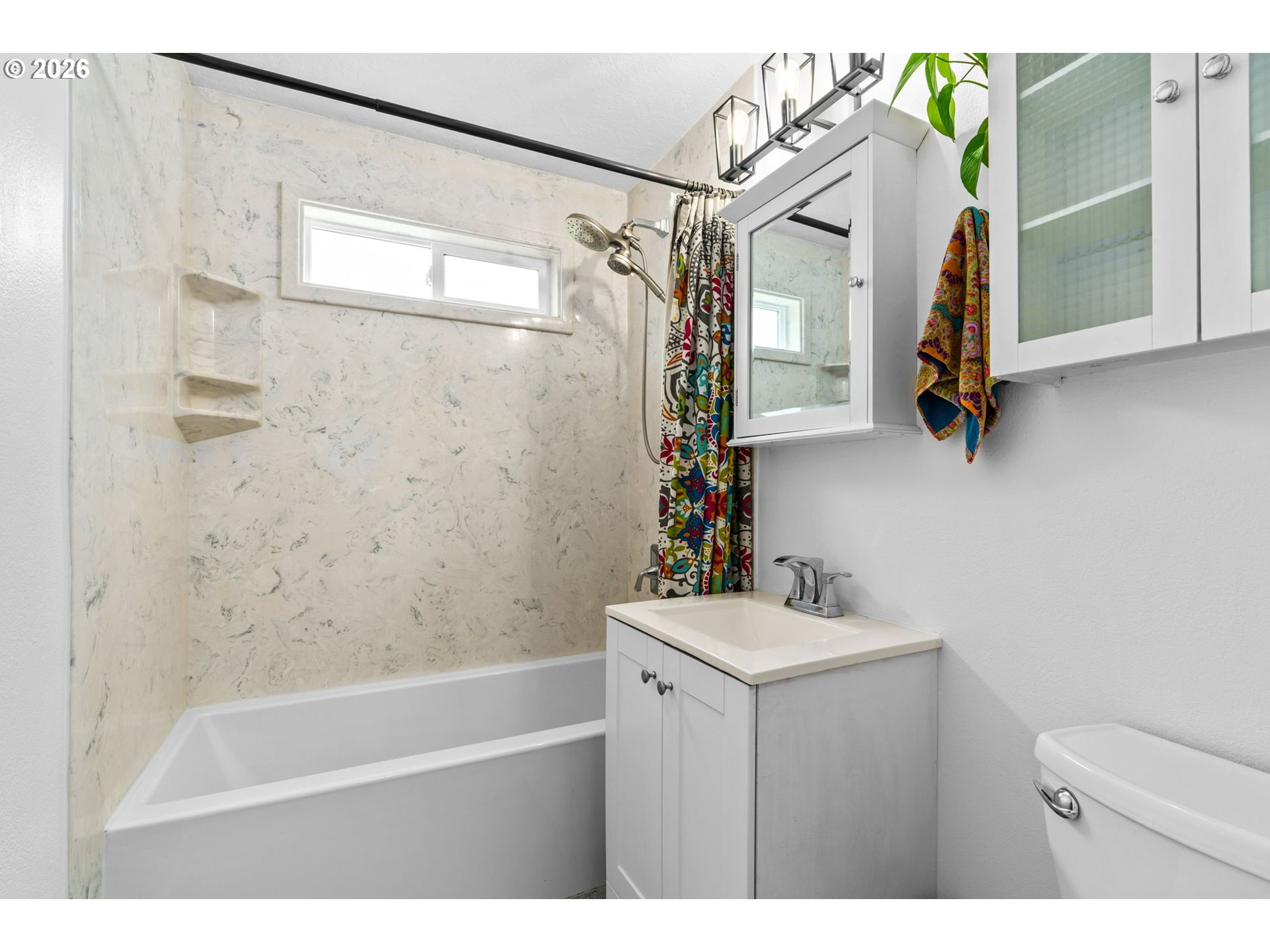 3155 Bell Avenue Eugene, OR 97402 - Photo 22 of 30 a bathroom with a sink a toilet and shower
