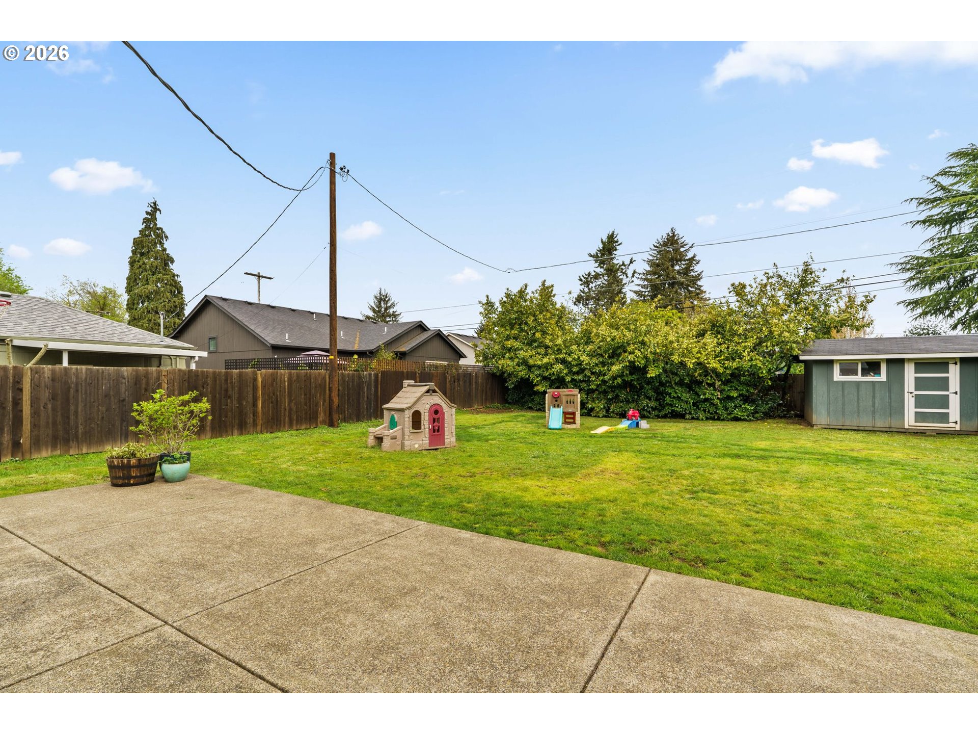3155 Bell Avenue Eugene, OR 97402 - Photo 23 of 30 a backyard of a house and cars parked