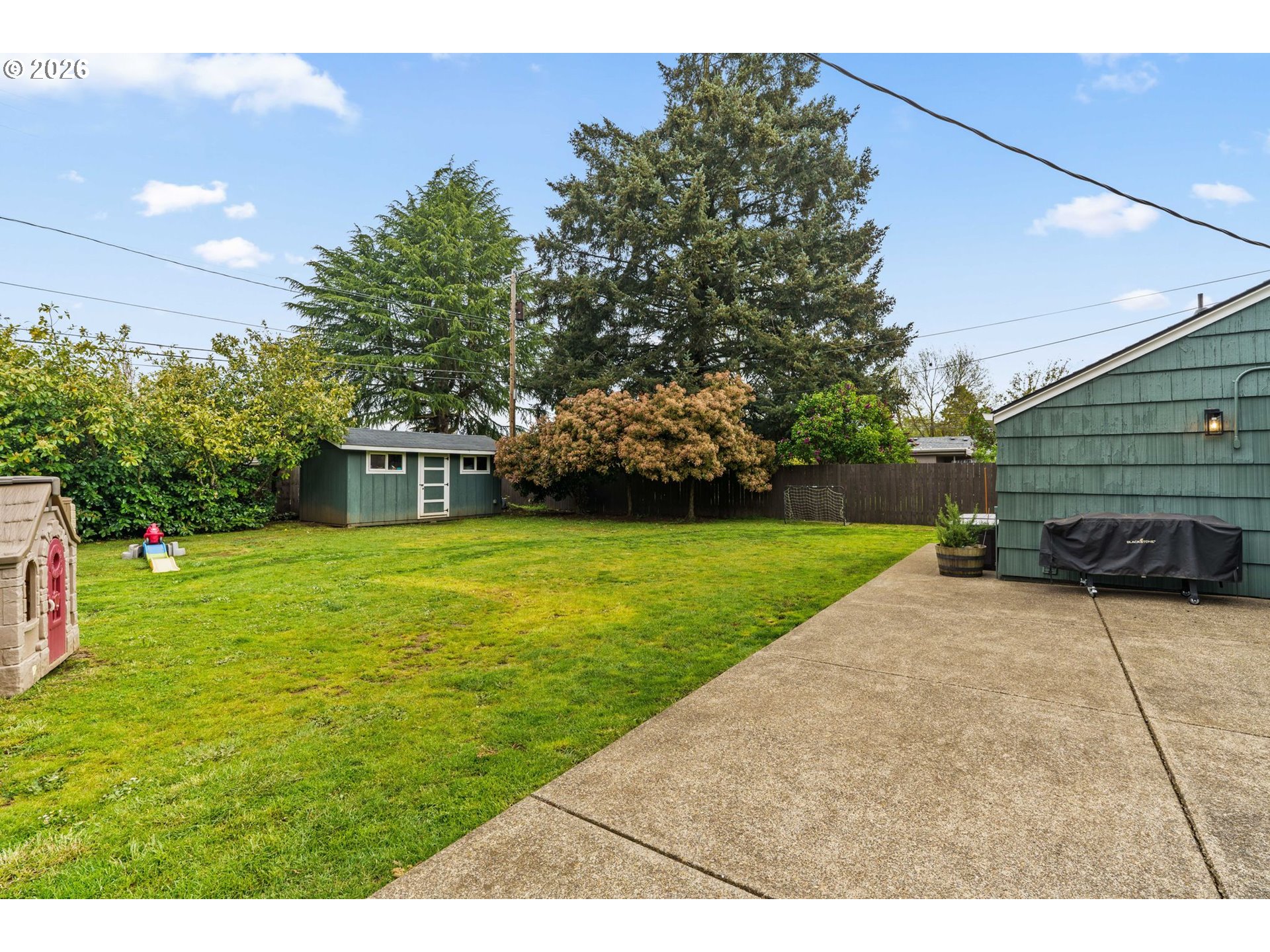 3155 Bell Avenue Eugene, OR 97402 - Photo 24 of 30 a front view of a house with garden