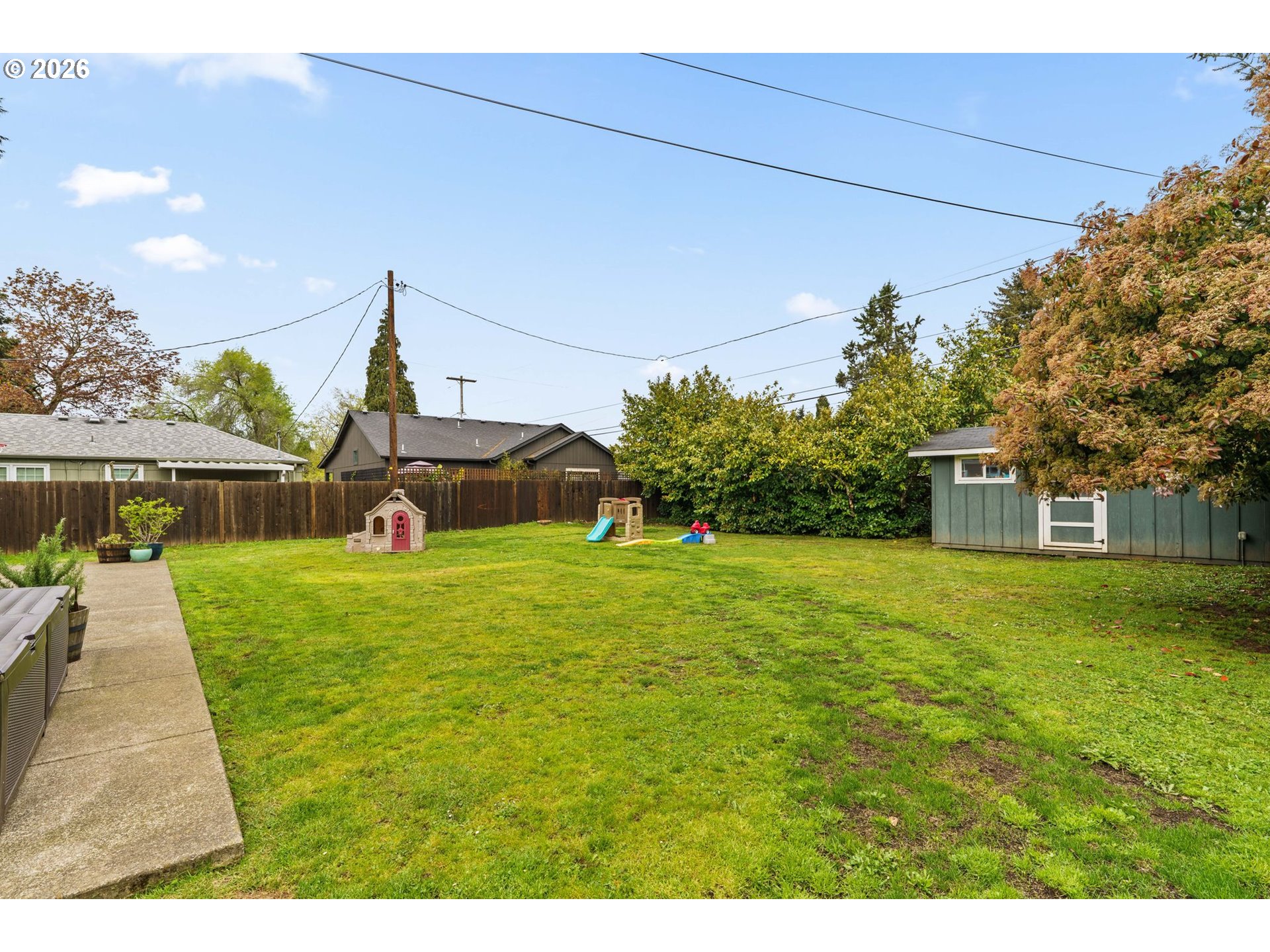 3155 Bell Avenue Eugene, OR 97402 - Photo 26 of 30 a front view of a house with a yard and trees