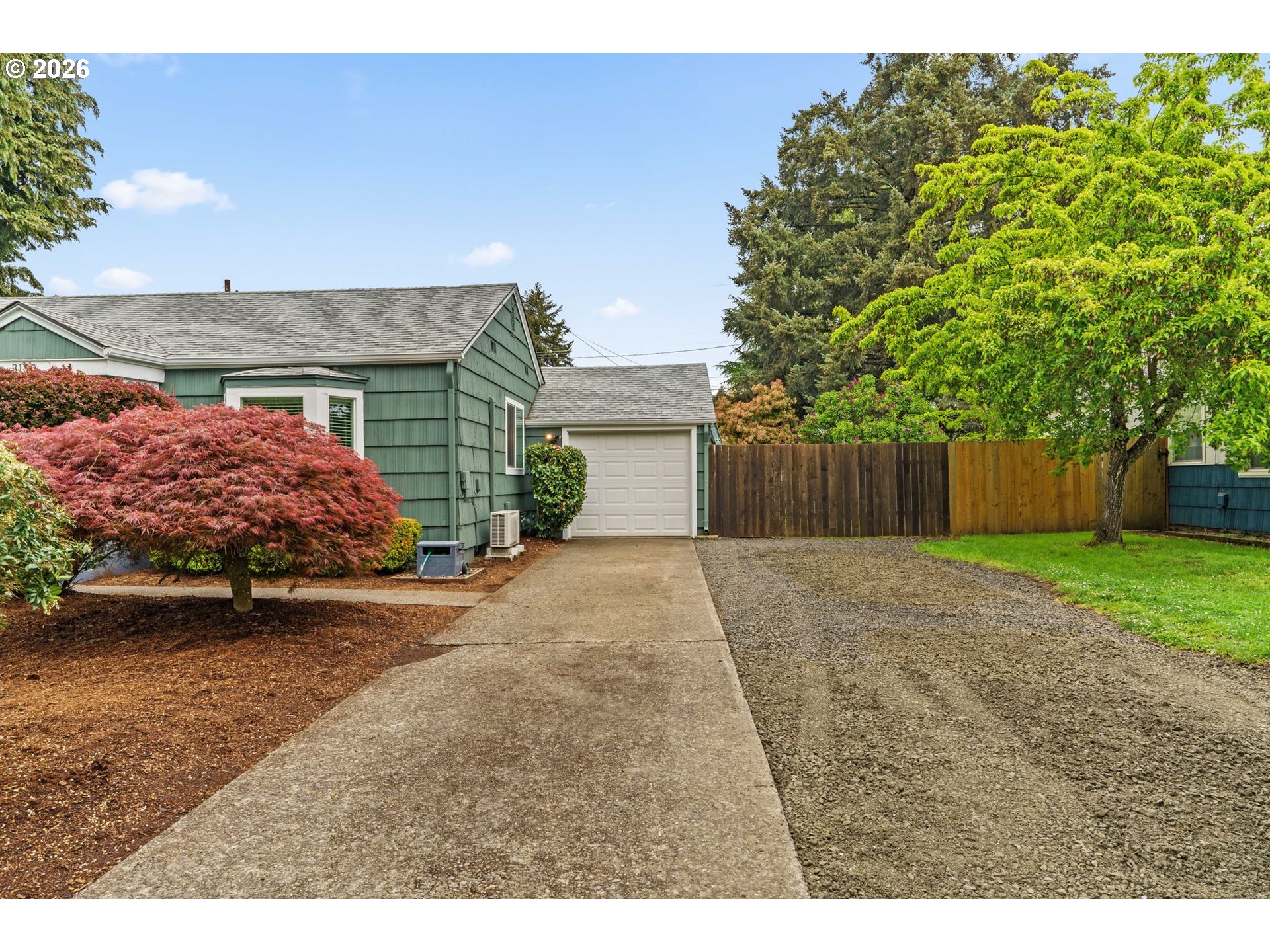 3155 Bell Avenue Eugene, OR 97402 - Photo 4 of 30 a view of a house with a yard and garage