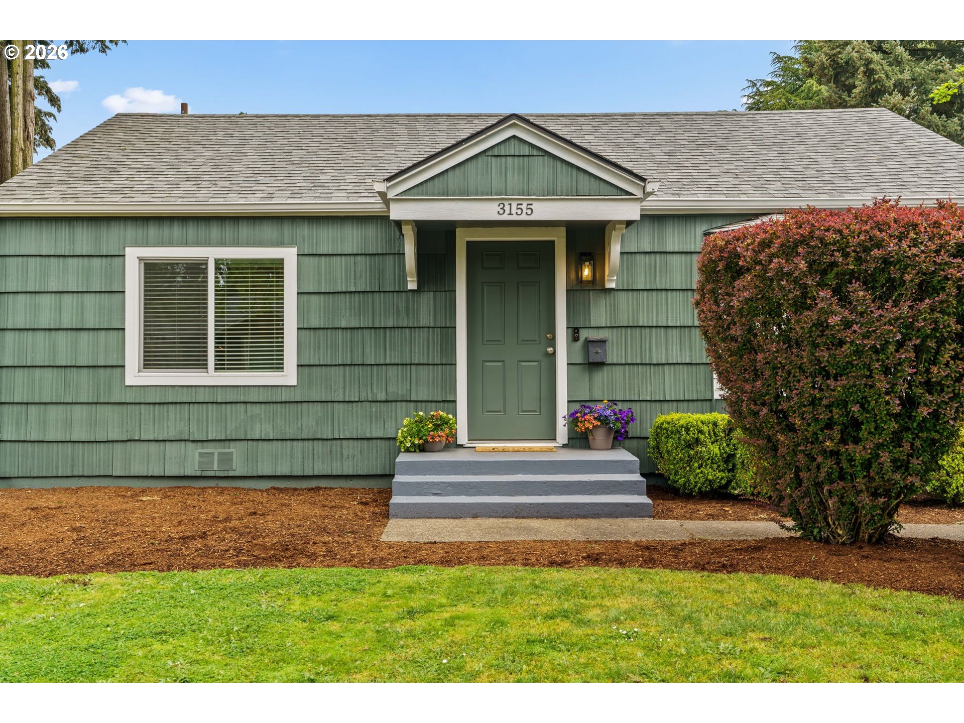 3155 Bell Avenue Eugene, OR 97402 - Photo 5 of 30 a front view of a house with a yard