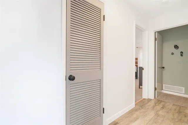 a view of a bathroom with a shower curtain