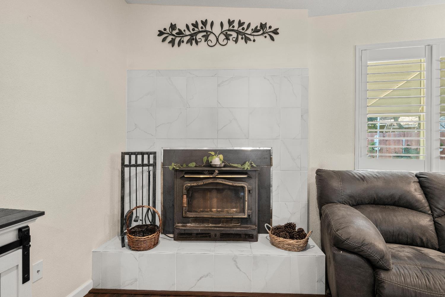 2768 Butte House Road Yuba City, CA 95993 - Photo 16 of 43 a living room with furniture a window and a fireplace