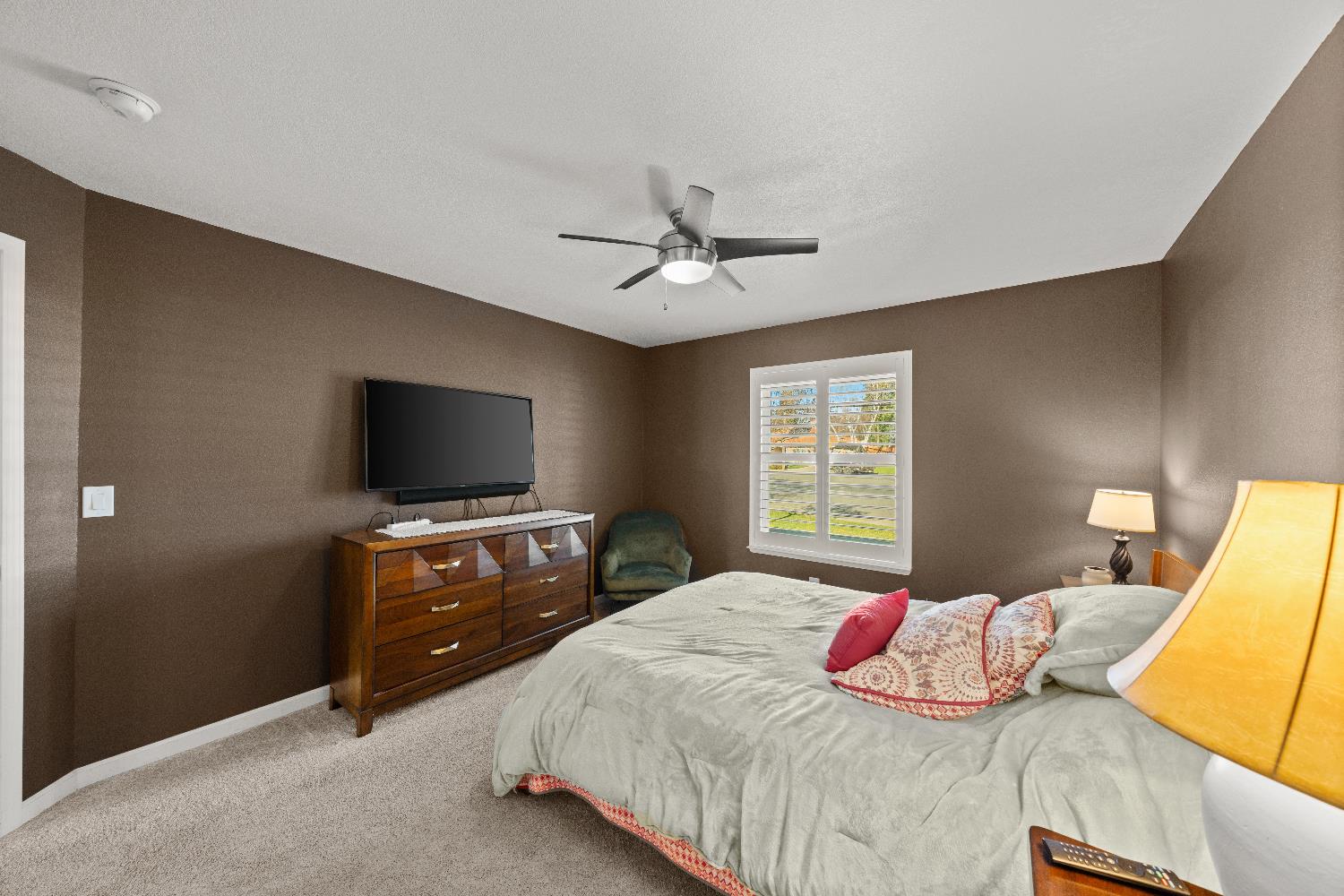 2768 Butte House Road Yuba City, CA 95993 - Photo 22 of 43 a bedroom with a bed and a flat screen tv