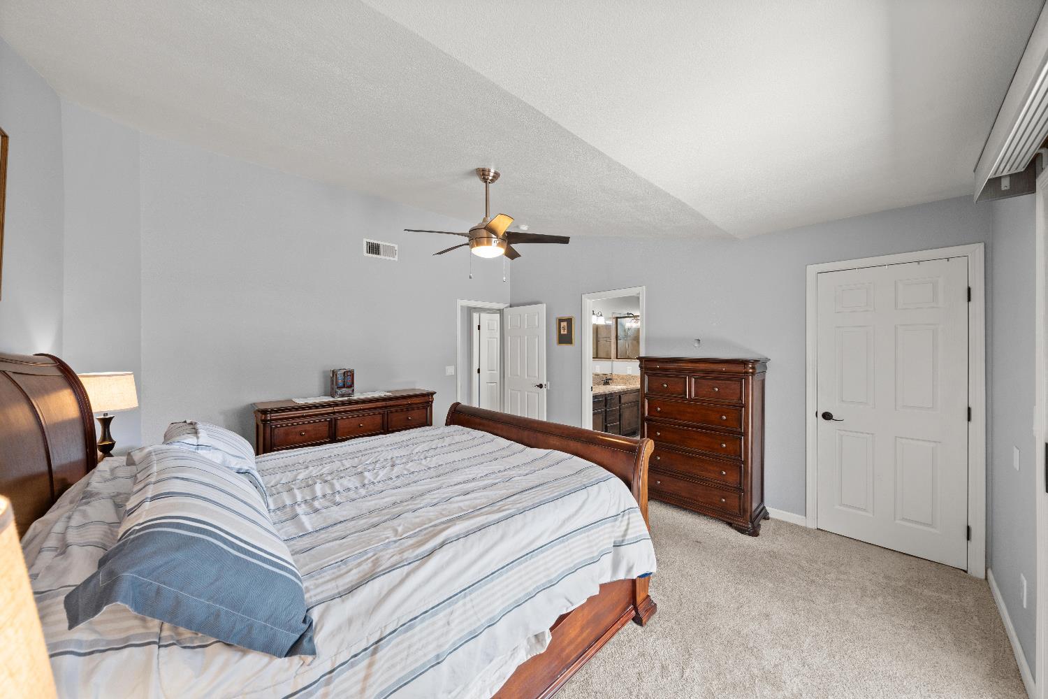 2768 Butte House Road Yuba City, CA 95993 - Photo 25 of 43 a bedroom with a bed and dresser
