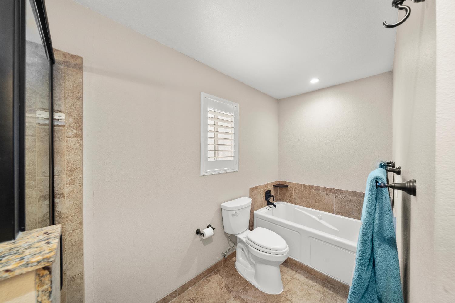2768 Butte House Road Yuba City, CA 95993 - Photo 28 of 43 a bathroom with a toilet and a shower