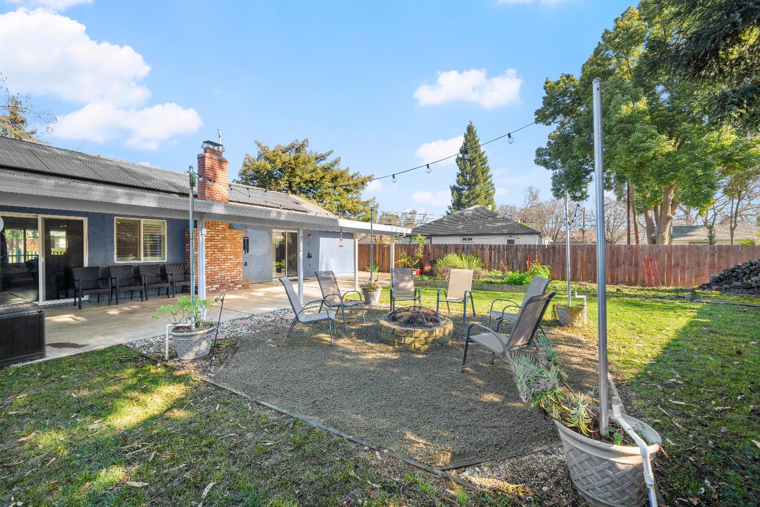 2768 Butte House Road Yuba City, CA 95993 - Photo 33 of 43 a view of a house with backyard porch and sitting area