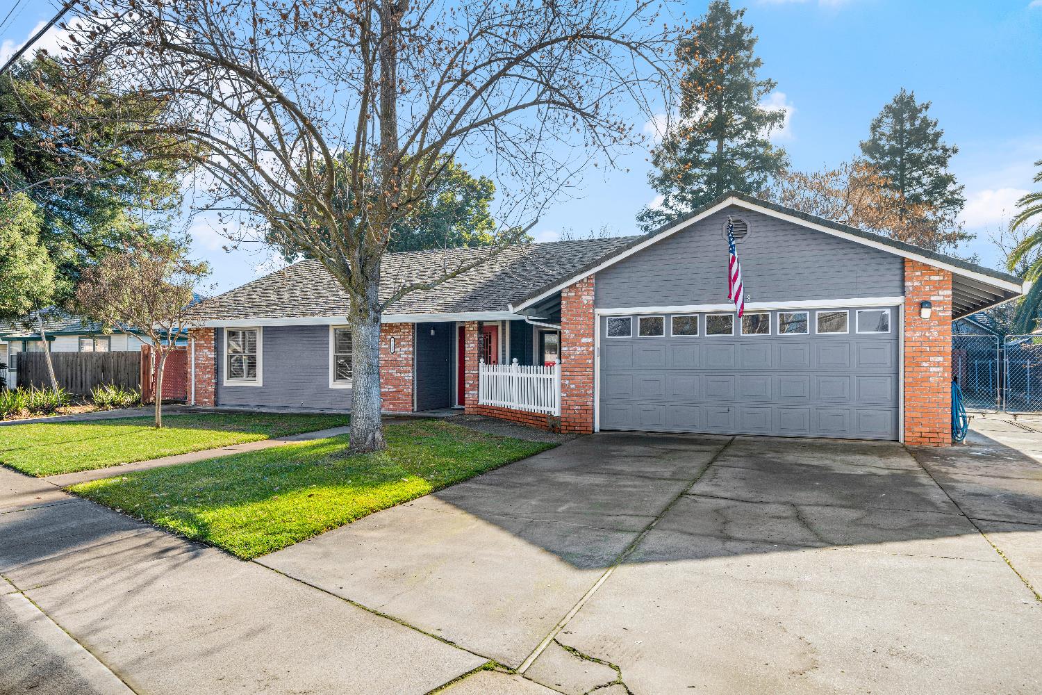 2768 Butte House Road Yuba City, CA 95993 - Photo 38 of 43 a front view of a house with a yard and trees
