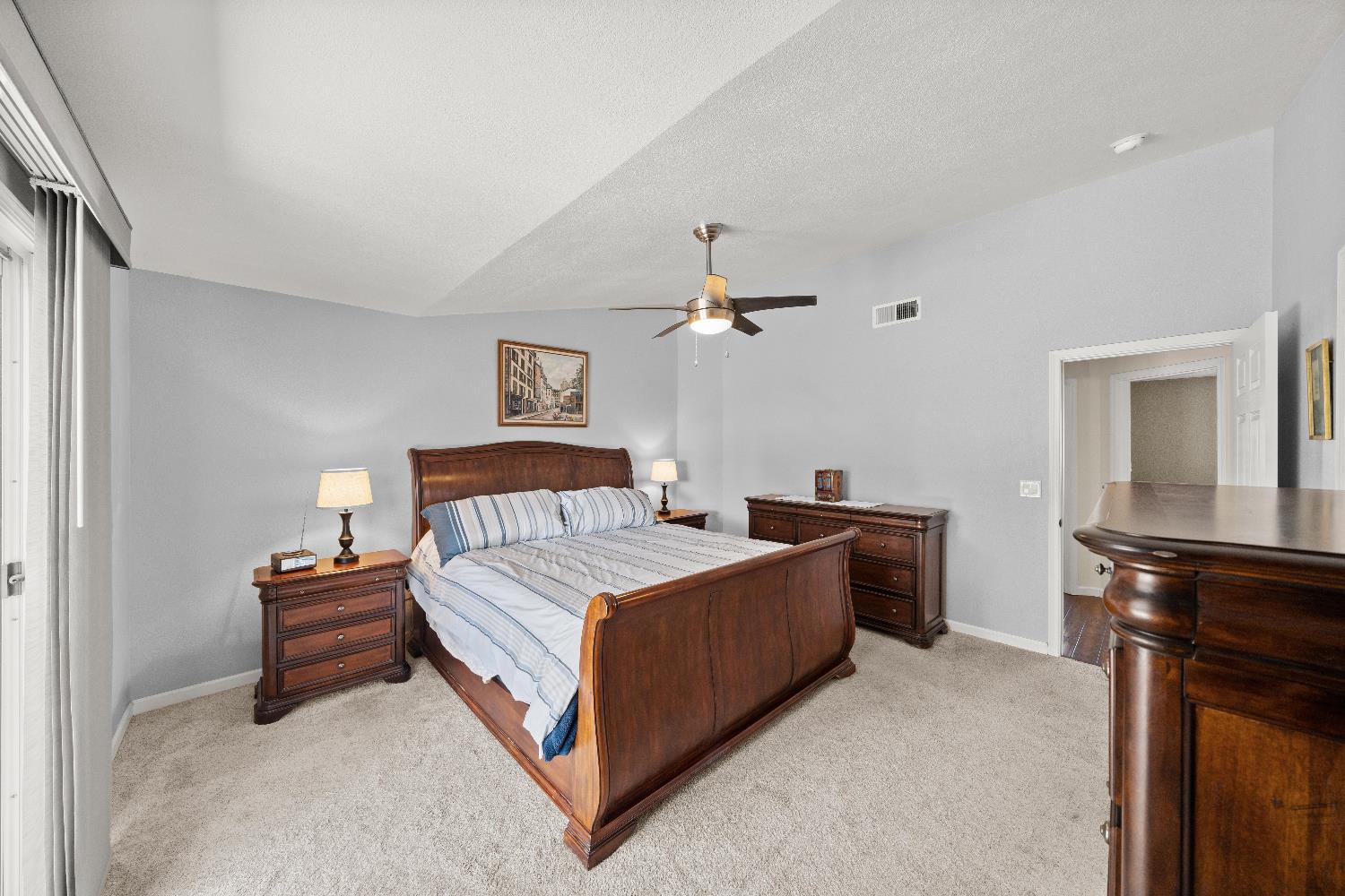 2768 Butte House Road Yuba City, CA 95993 - Photo 5 of 43 a bedroom with a bed and dresser