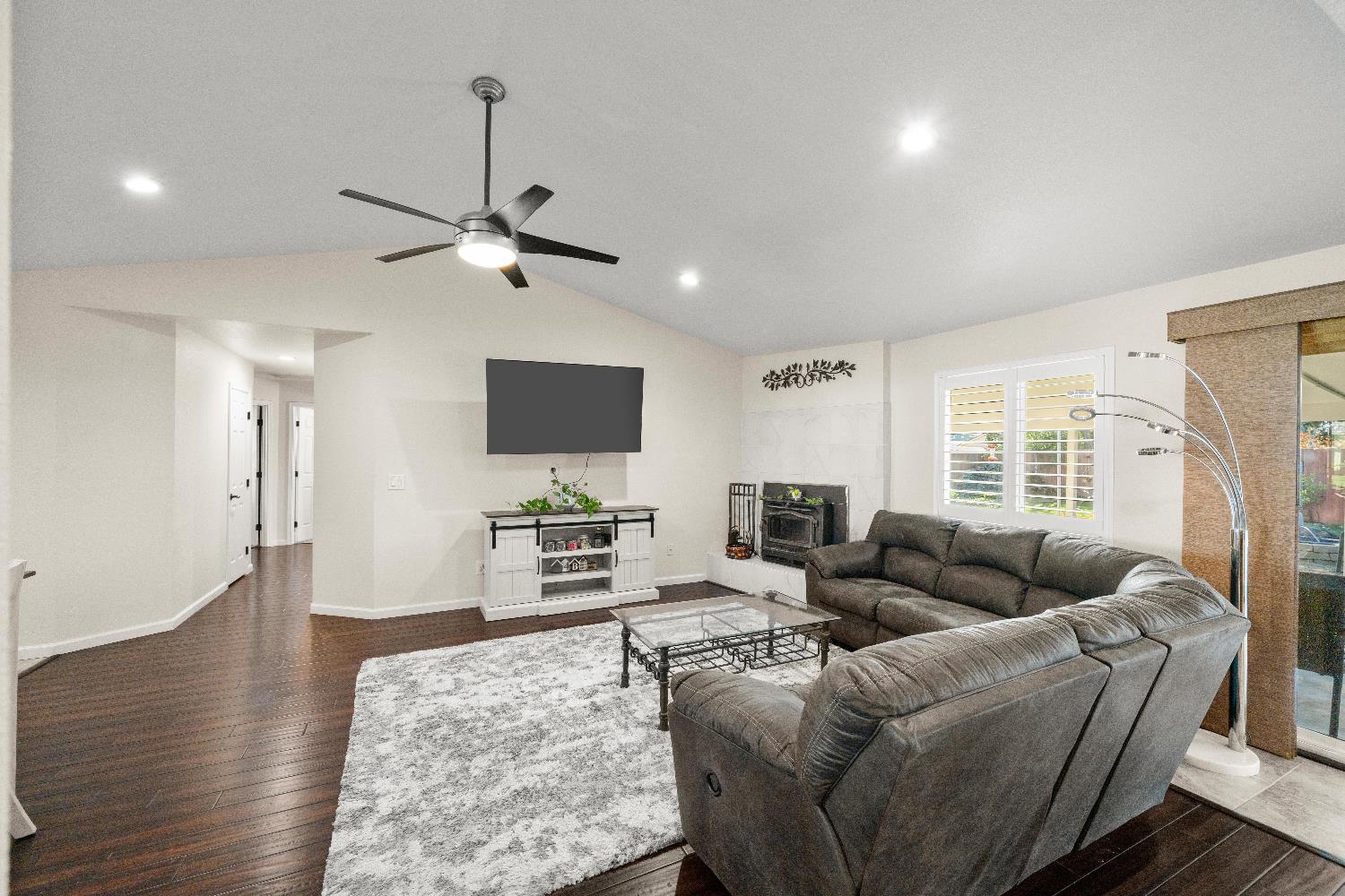 2768 Butte House Road Yuba City, CA 95993 - Photo 8 of 43 a living room with furniture and a flat screen tv