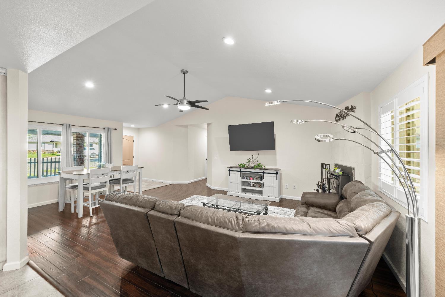 2768 Butte House Road Yuba City, CA 95993 - Photo 9 of 43 a living room with furniture and a flat screen tv