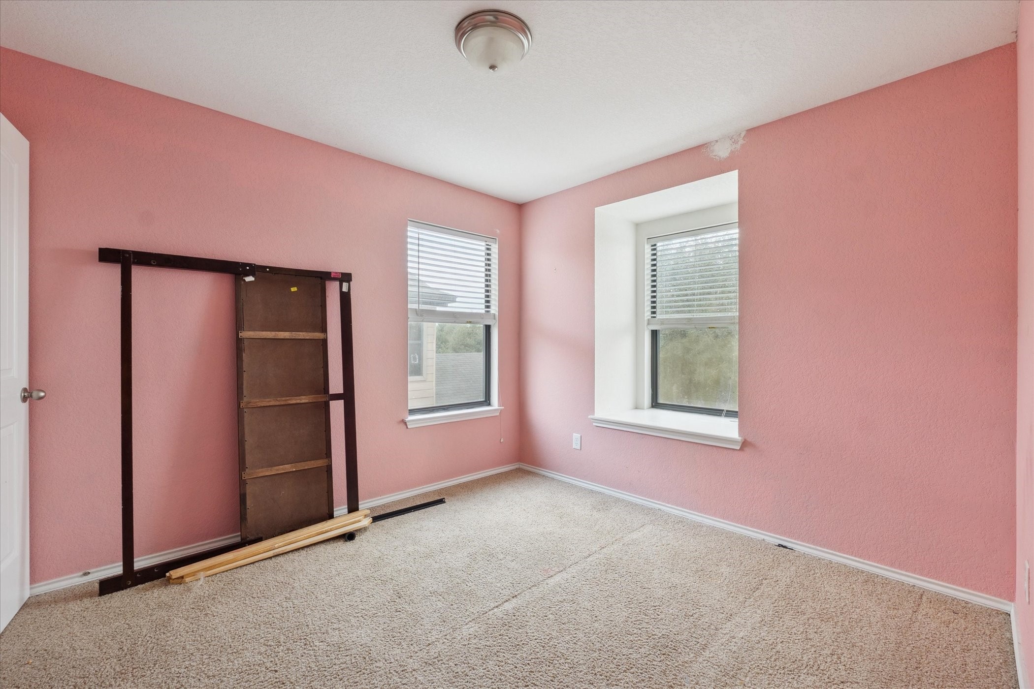 6630 San Miguel Way Converse, TX 78109 - Photo 11 of 14 an empty room with windows
