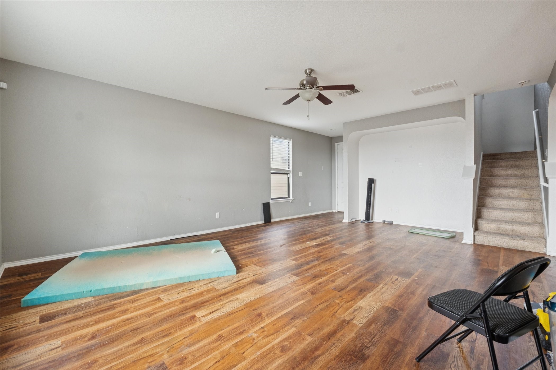 6630 San Miguel Way Converse, TX 78109 - Photo 3 of 14 a view of empty room with wooden floor and fan