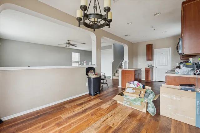 a view of a kitchen and dining room