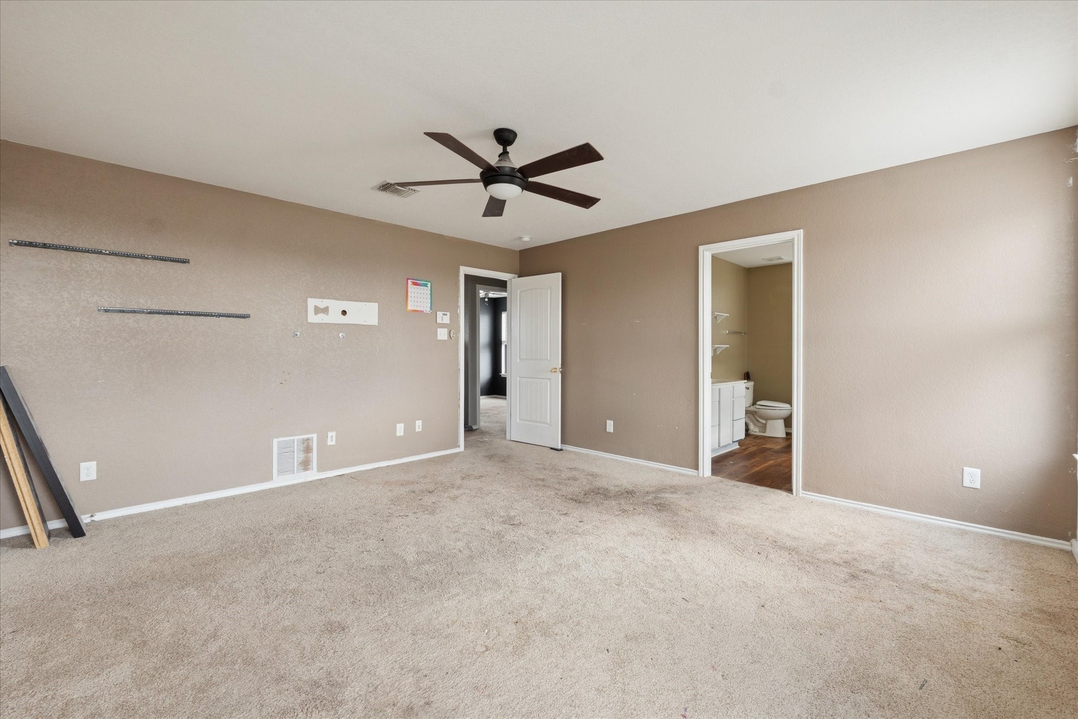 6630 San Miguel Way Converse, TX 78109 - Photo 8 of 14 a view of a big room with carpet