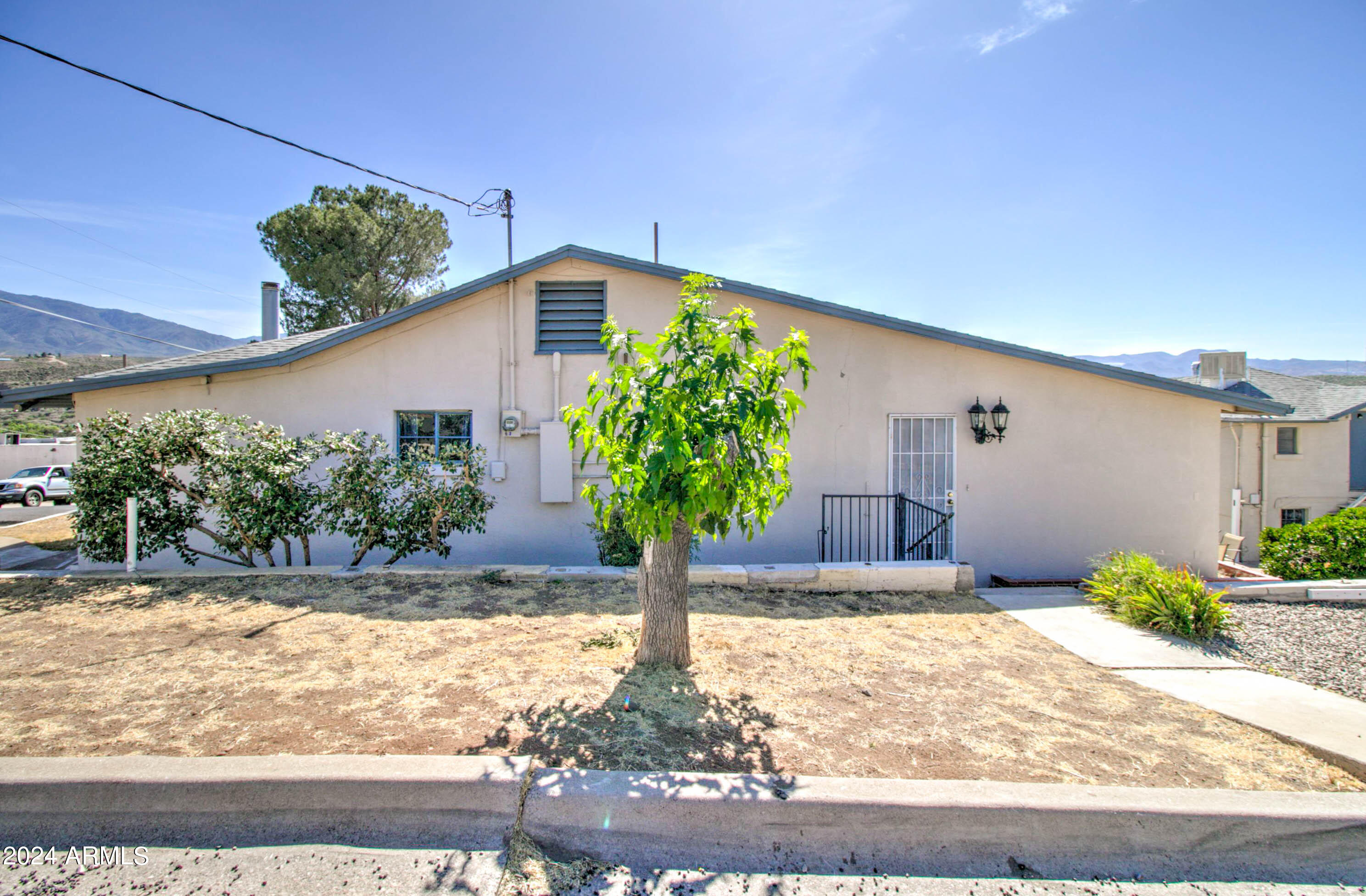 877 East Sycamore Street Globe, AZ 85501 - Photo 4 of 51 a house view with a outdoor space