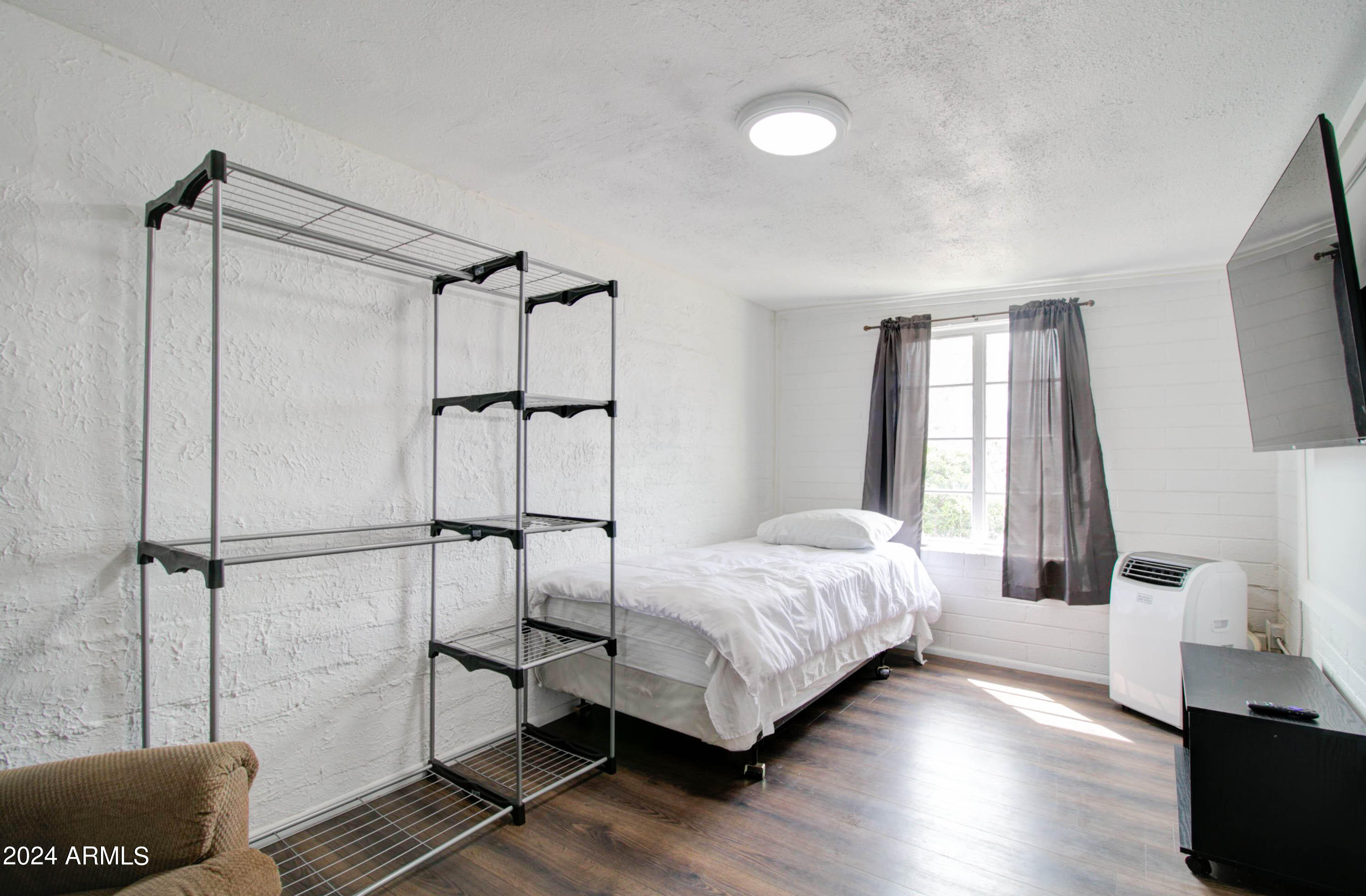 877 East Sycamore Street Globe, AZ 85501 - Photo 48 of 51 a bedroom with a bed and a window