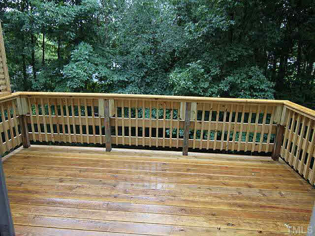 5546 Hamstead Crossing Raleigh, NC 27612 - Photo 3 of 17 Beautiful new large deck off Livingroom! Great for entertaining and very private!