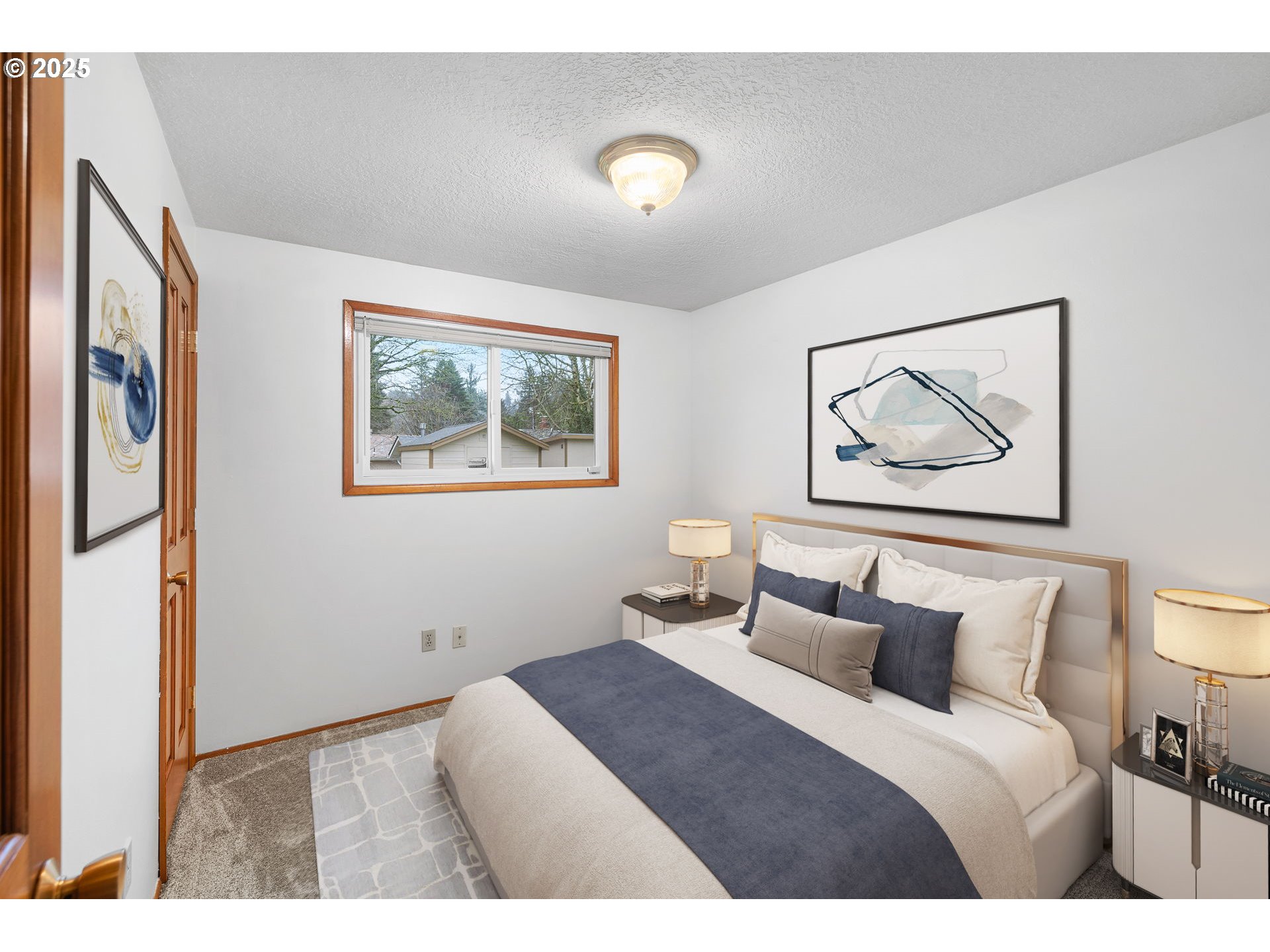 15916 Southeast Brooklyn Street Portland, OR 97236 - Photo 12 of 24 a bedroom with bed and wall painting
