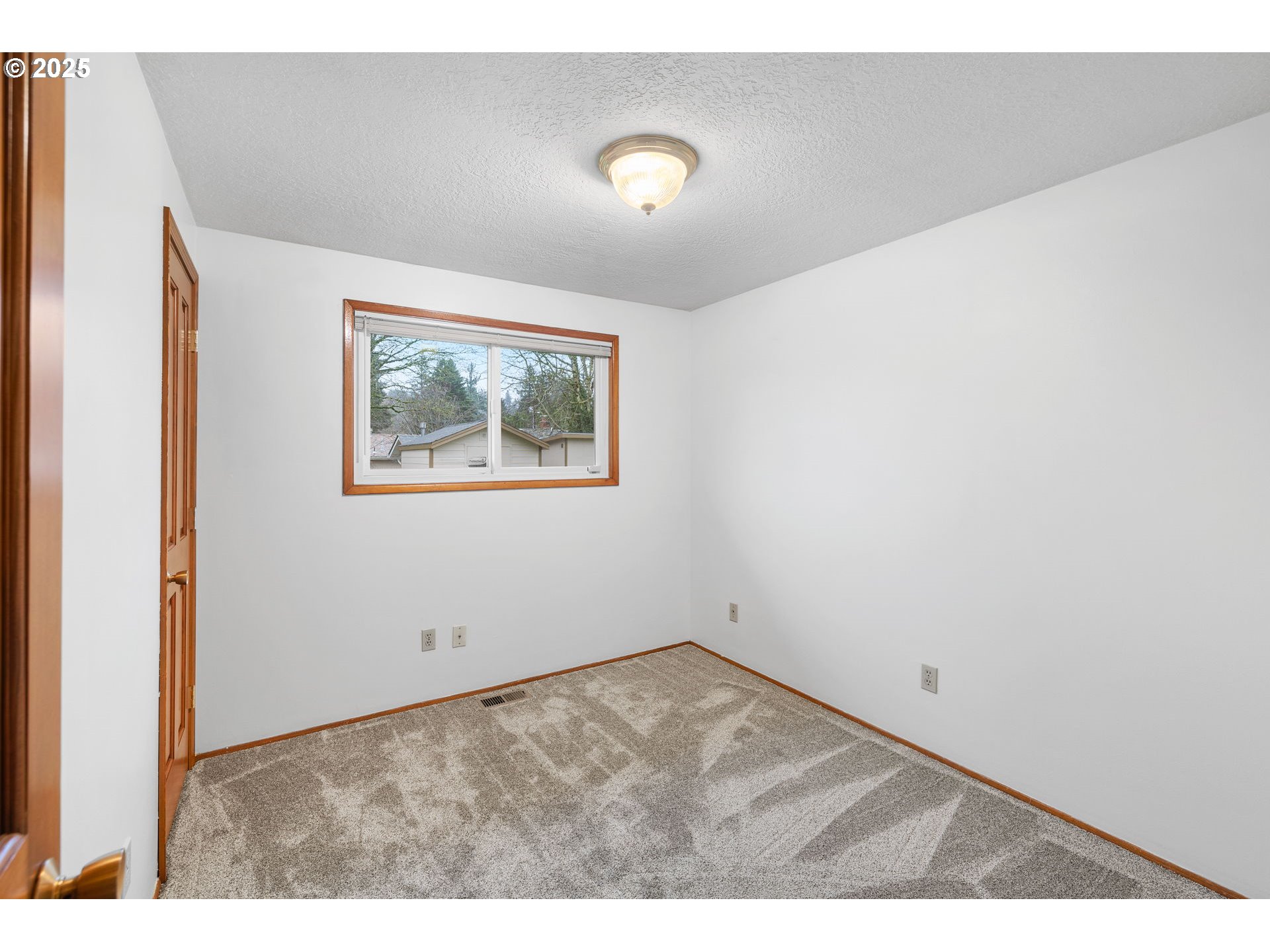 15916 Southeast Brooklyn Street Portland, OR 97236 - Photo 13 of 24 a view of an empty room