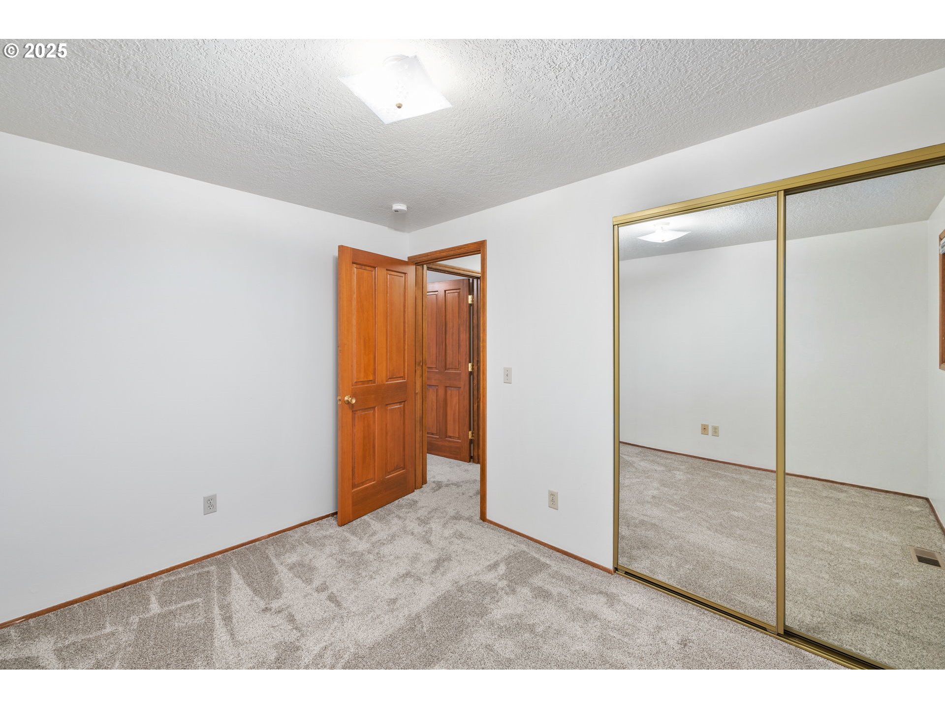 15916 Southeast Brooklyn Street Portland, OR 97236 - Photo 17 of 24 a view of an empty room