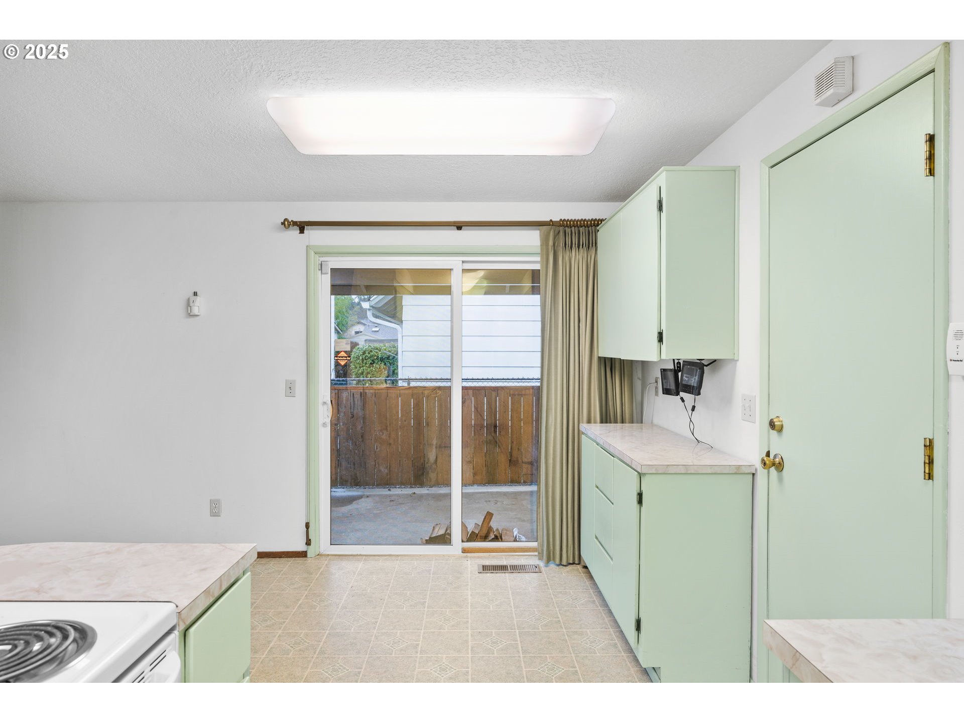 15916 Southeast Brooklyn Street Portland, OR 97236 - Photo 9 of 24 a room with a sink and a large mirror