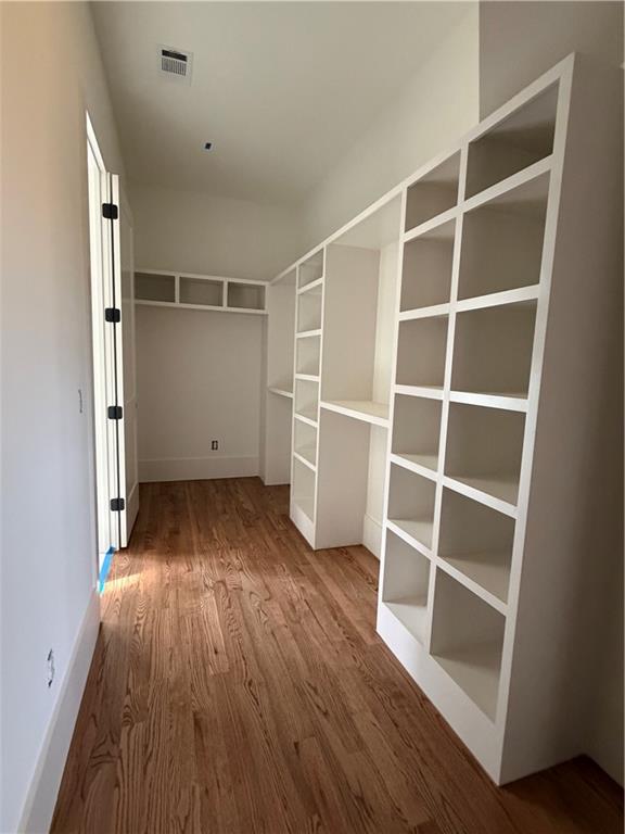 1040 Oak Valley Road Greensboro, GA 30642 - Photo 14 of 20 a view of empty room with wooden floor and closet