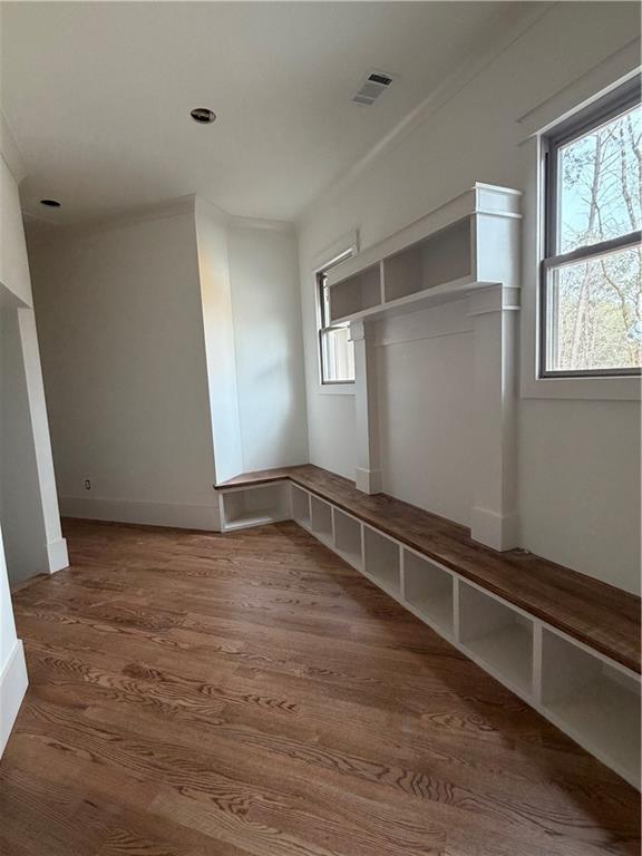 1040 Oak Valley Road Greensboro, GA 30642 - Photo 15 of 20 a view of an empty room with wooden floor and a window