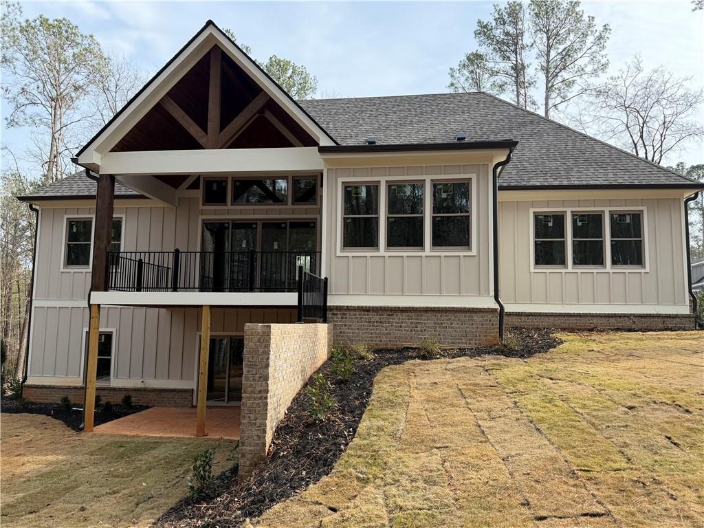 1040 Oak Valley Road Greensboro, GA 30642 - Photo 3 of 20 a front view of a house with a garden