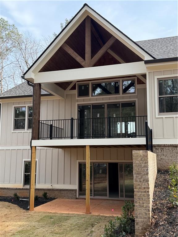 1040 Oak Valley Road Greensboro, GA 30642 - Photo 4 of 20 a front view of a house with a yard