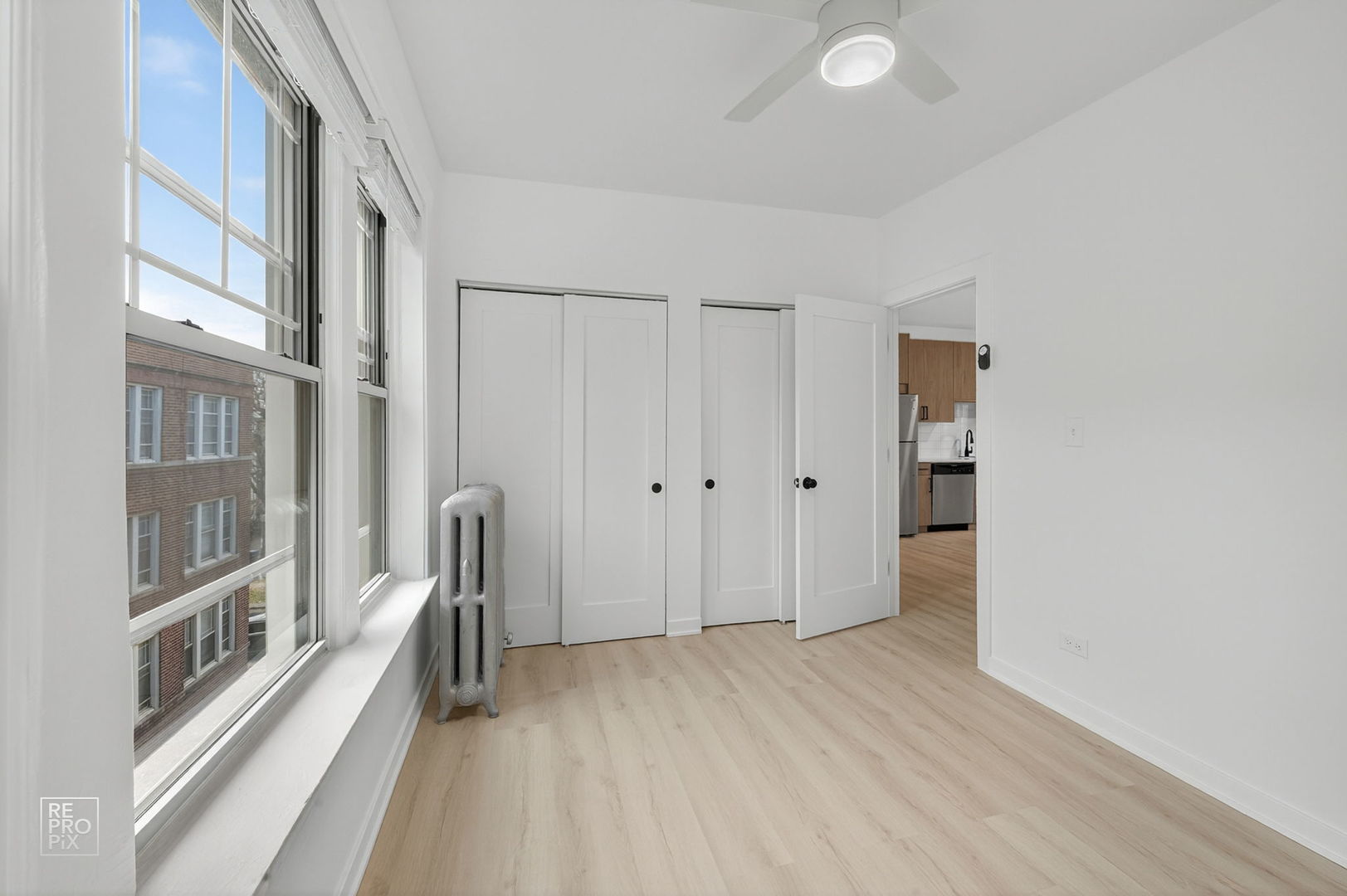 6975 North Bell Avenue, Unit 2 Chicago, IL 60645 - Photo 6 of 11 a view of a bathroom with a sink
