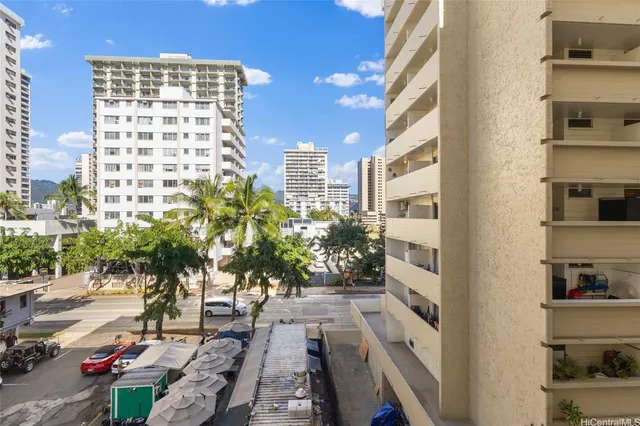 a view of balcony with potted plants