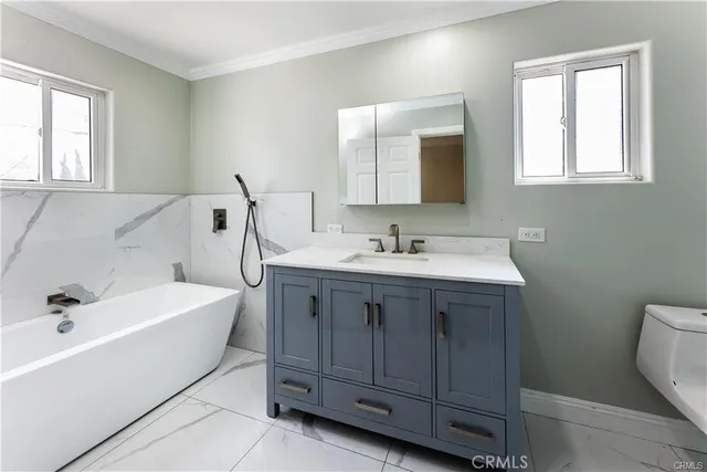 a bathroom with a sink and a bathtub