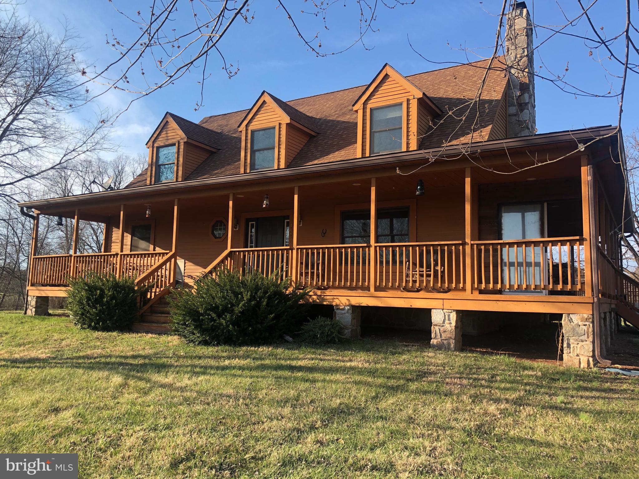 12550 Shoemaker Road Taneytown, MD 21787 - Photo 1 of 40 a view of a house with a swimming pool