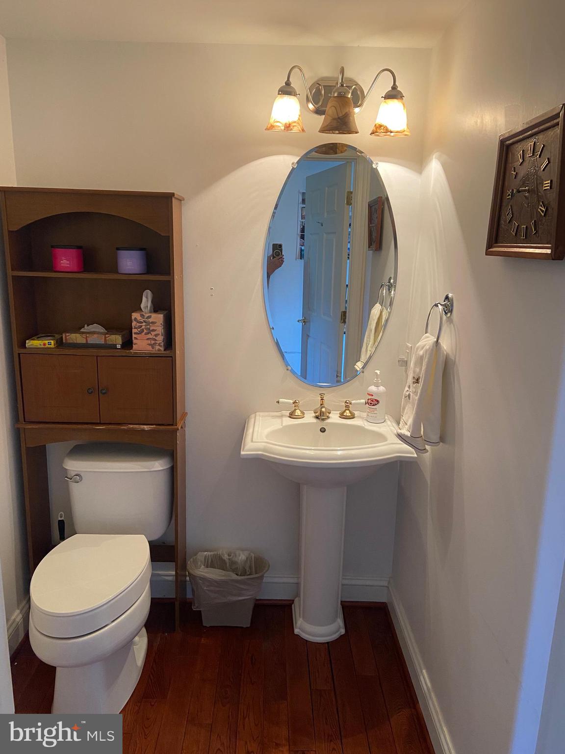 12550 Shoemaker Road Taneytown, MD 21787 - Photo 11 of 40 a bathroom with a toilet sink and mirror