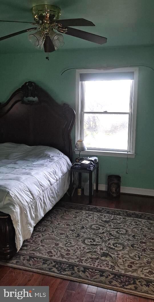 12550 Shoemaker Road Taneytown, MD 21787 - Photo 12 of 40 a bedroom with a bed and a window