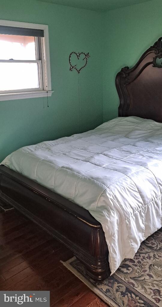12550 Shoemaker Road Taneytown, MD 21787 - Photo 13 of 40 a bedroom with a bed and a window