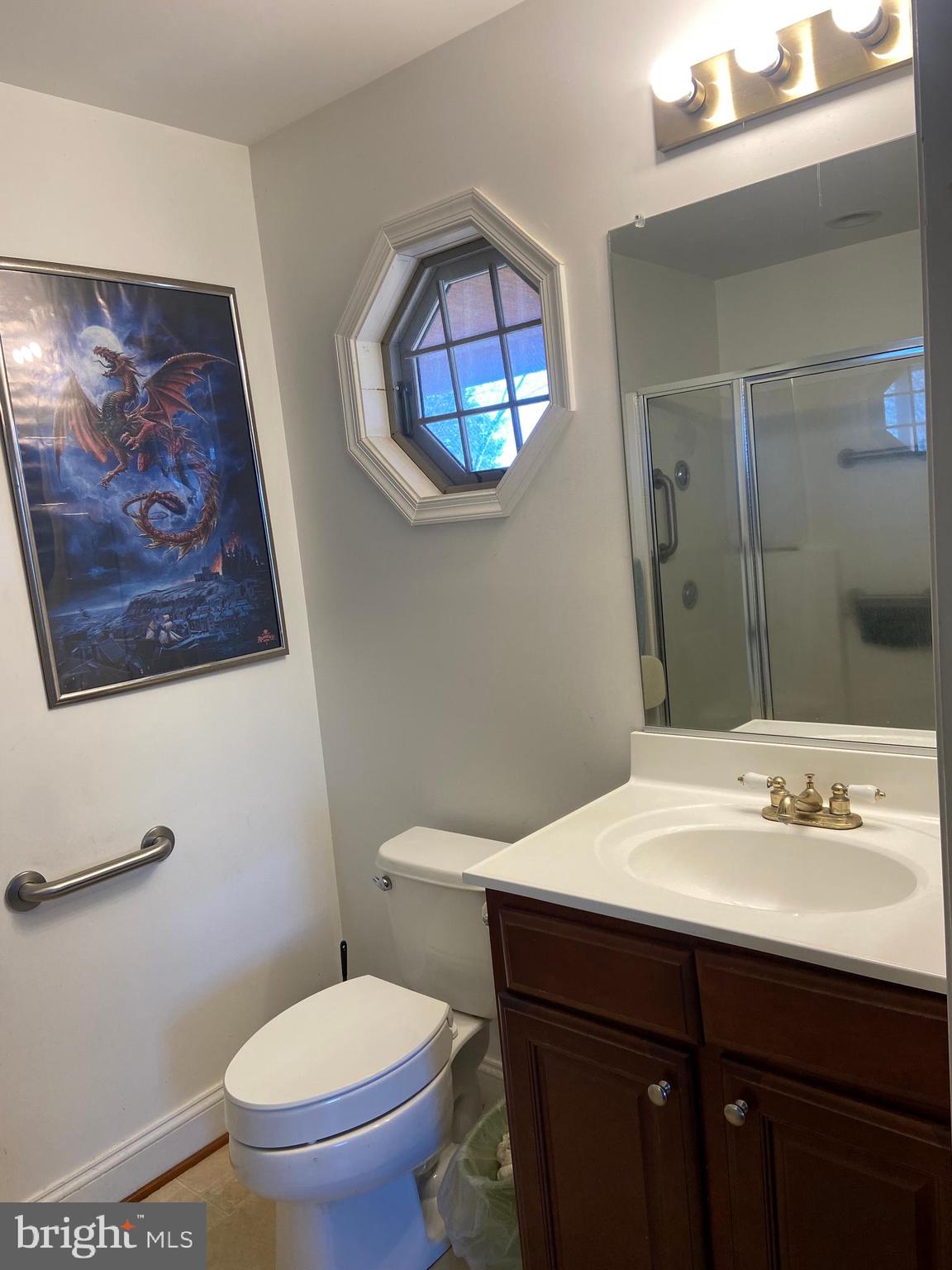 12550 Shoemaker Road Taneytown, MD 21787 - Photo 17 of 40 a bathroom with a sink and a mirror